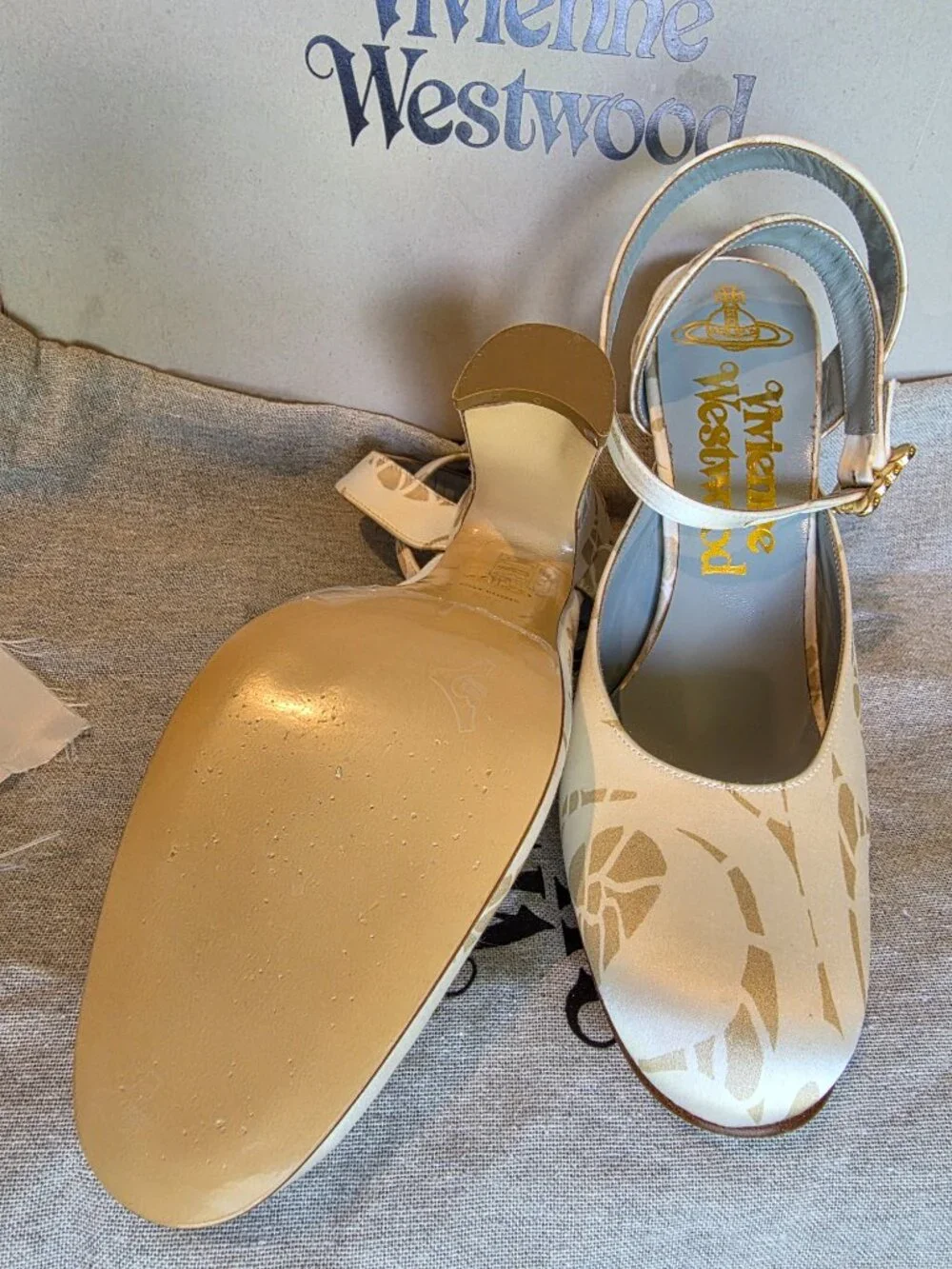 VIVIENNE WESTWOOD IVORY & GOLD PRINT PLATFORM ANKLE STRAP HEELS